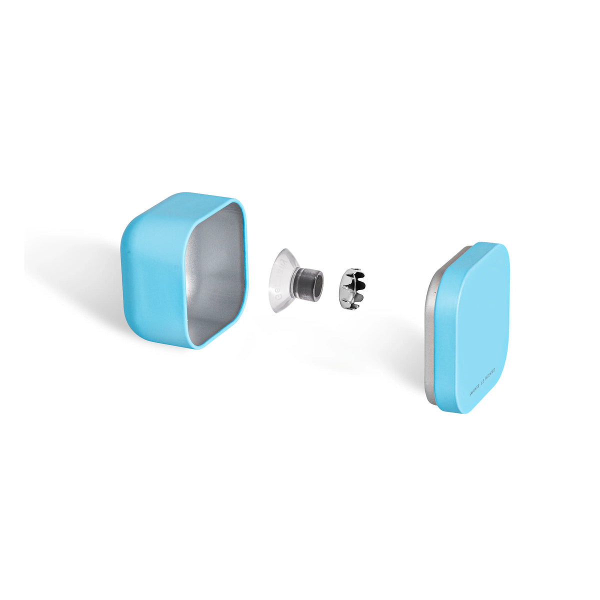 Vue éclatée d’une boîte à savon AirBox bleu clair avec couvercle à centre blanc vierge, porte-savon aimanté et capsule séparés