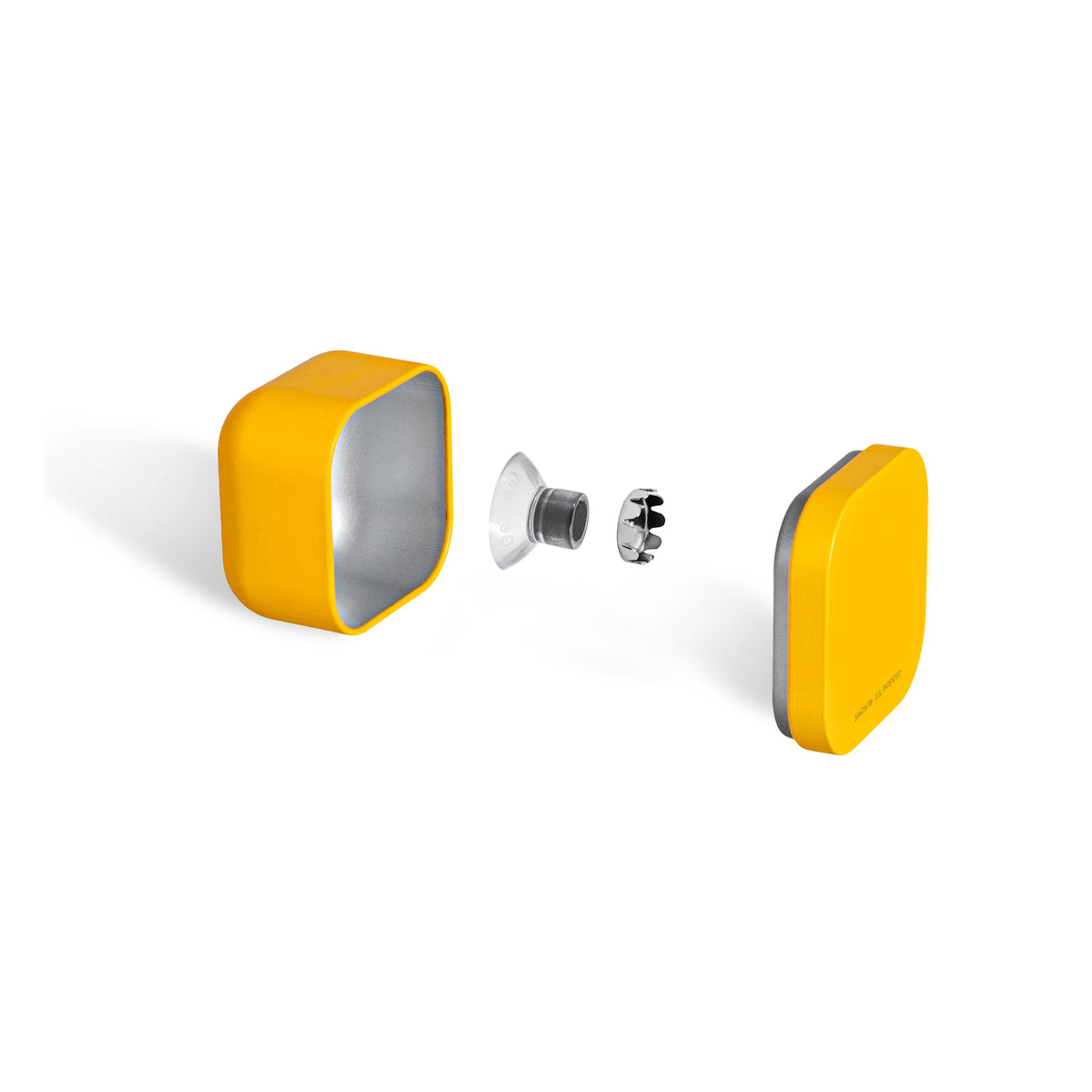 Vue éclatée d’une boîte à savon AirBox jaune avec couvercle à centre blanc vierge, porte-savon aimanté et capsule séparés